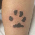 hondenpoot tatoeage